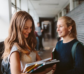 Two young women chatting